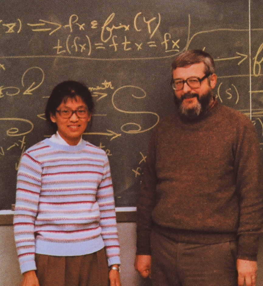 Xiao-Qing Meng and Bill in the Math Department common room of Diefendorf Hall, year? (mid 1980s)